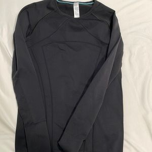 A black Ivivva long sleeve athletic shirt.